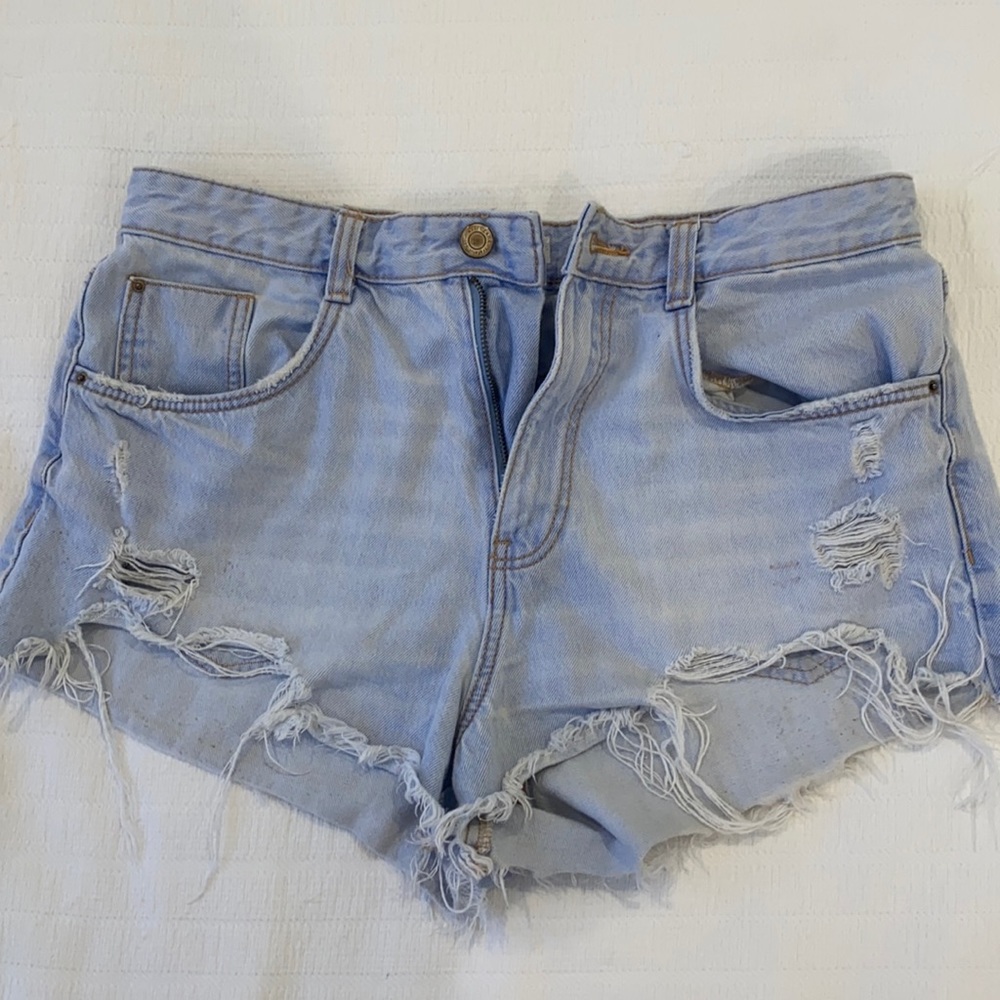 Distressed denim shorts